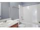 Bathroom features a shower-tub combination, a single-sink vanity and a toilet at 4136 Orchard Valley Ln, Indianapolis, IN 46235