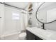 Bathroom featuring a bathtub, white subway tile, and a modern vanity at 4245 Guilford Ave, Indianapolis, IN 46205