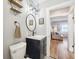 Bathroom featuring modern vanity, black finishes, and tiled floor at 4245 Guilford Ave, Indianapolis, IN 46205