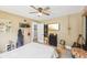 Bedroom featuring ceiling fan, neutral walls, and plenty of decor at 4245 Guilford Ave, Indianapolis, IN 46205