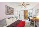 Bedroom featuring a daybed, desk, and modern accents at 4245 Guilford Ave, Indianapolis, IN 46205