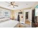 Bedroom featuring plenty of natural light and hardwood flooring at 4245 Guilford Ave, Indianapolis, IN 46205