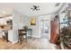 Dining area features a table, chair, and kitchen access, with a view of a doorway to another room at 4245 Guilford Ave, Indianapolis, IN 46205