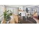 Cozy dining room featuring hardwood floors, natural light, and a decorative fireplace at 4245 Guilford Ave, Indianapolis, IN 46205