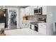 Modern kitchen featuring stainless steel appliances, and quartz countertops at 4245 Guilford Ave, Indianapolis, IN 46205
