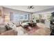 Comfortable living room with wainscoting, stylish decor, and an open floor plan at 4245 Guilford Ave, Indianapolis, IN 46205