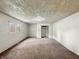 Spacious bedroom with natural light, a standard closet, and carpeted floors at 425 S Oakland Ave, Indianapolis, IN 46201