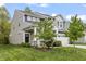 Beautiful two-story home featuring gray siding, a well-maintained lawn, and a two-car garage at 4629 Rainwater Ln, Whitestown, IN 46075