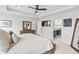 Bright main bedroom showing an attached bathroom with double vanity at 4629 Rainwater Ln, Whitestown, IN 46075