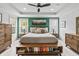 Comfortable main bedroom featuring a large bed, modern decor and natural lighting at 4629 Rainwater Ln, Whitestown, IN 46075