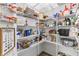 Walk-in pantry offers abundant storage space with shelving and ample room for organization at 4629 Rainwater Ln, Whitestown, IN 46075