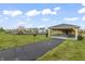 Community playground featuring a covered picnic area, playground equipment, and open green space at 4629 Rainwater Ln, Whitestown, IN 46075