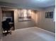 Finished basement area featuring an office space and artwork on the walls at 4719 Arabian Run, Indianapolis, IN 46228
