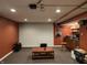 Large basement space with recessed lighting, projector, and media center at 4719 Arabian Run, Indianapolis, IN 46228