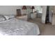 Bright bedroom with white-painted dresser, lamp and mirrored closet door at 4719 Arabian Run, Indianapolis, IN 46228