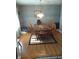 Cozy dining room with hardwood floors, a wooden table, and matching chairs at 4719 Arabian Run, Indianapolis, IN 46228