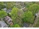 Desirable neighborhood showcasing tree-lined streets and houses with well-kept yards at 4810 Winthrop Ave, Indianapolis, IN 46205