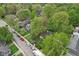 Charming residential street with cozy homes features mature trees and well-groomed yards at 4810 Winthrop Ave, Indianapolis, IN 46205