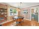 Cozy dining area featuring a round table, stylish chairs, and an attractive light fixture at 4810 Winthrop Ave, Indianapolis, IN 46205