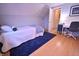 Comfortable bedroom with a bed, desk, and stylish decor at 51 Wilson Dr, Carmel, IN 46032