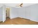 A spacious bedroom with hardwood floors and a large closet at 51 Wilson Dr, Carmel, IN 46032