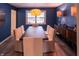 Stylish dining room with a dark wood table, contemporary lighting, and ample seating for gatherings at 51 Wilson Dr, Carmel, IN 46032