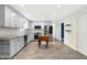 Spacious kitchen featuring stainless appliances, light gray cabinetry, and a butcher block island at 51 Wilson Dr, Carmel, IN 46032