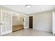 A sunlit office with glass French doors and neutral walls creates a calm and productive workspace at 51 Wilson Dr, Carmel, IN 46032