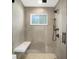 Modern shower features gray tiled walls, a fixed shower head and a built in bench at 51 Wilson Dr, Carmel, IN 46032