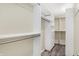 Spacious walk-in closet with custom shelving and chrome racks for optimal organization at 51 Wilson Dr, Carmel, IN 46032