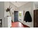Bright foyer featuring hardwood floors, high ceilings, and an attractive chandelier at 5348 Pelham Way, Indianapolis, IN 46216