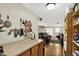 Galley kitchen leading to basement with theatre seating at 5348 Pelham Way, Indianapolis, IN 46216