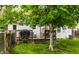 Lush backyard with a deck and comfortable seating for relaxing and taking in the outdoor views of the property at 5643 Rosslyn Ave, Indianapolis, IN 46220