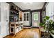 Entryway features hardwood floors, kitchen access and natural light at 5643 Rosslyn Ave, Indianapolis, IN 46220