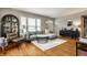 Cozy living room with hardwood floors, comfortable seating, and modern decor at 5643 Rosslyn Ave, Indianapolis, IN 46220