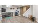 Finished basement area featuring vinyl floors, ample lighting and open space at 5829 Broadway St, Indianapolis, IN 46220