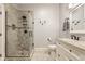 Updated bathroom featuring a glass-enclosed shower, and modern fixtures at 5829 Broadway St, Indianapolis, IN 46220