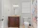 Bathroom featuring a vanity, toilet, and shower with curtain at 608 East 21St St, Indianapolis, IN 46202
