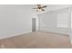 Bedroom with neutral carpet, ceiling fan, and a window at 608 East 21St St, Indianapolis, IN 46202