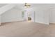 Spacious bedroom featuring neutral carpet, natural light, and en suite bathroom at 608 East 21St St, Indianapolis, IN 46202