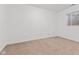 Neutral bedroom features a window with natural light and neutral carpet at 608 East 21St St, Indianapolis, IN 46202