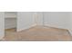 Neutral bedroom showing closet, open doorway, and carpet at 608 East 21St St, Indianapolis, IN 46202