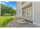 Welcoming entrance with stone pathway, concrete porch, and classic white door at 608 East 21St St, Indianapolis, IN 46202
