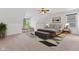 Main bedroom features neutral carpet, natural light and stylish decor at 608 East 21St St, Indianapolis, IN 46202