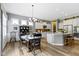 Open dining area connecting seamlessly with the kitchen, creating an inviting and functional space at 6150 Rolling Rock Ln, Noblesville, IN 46062