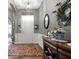 Charming foyer featuring stylish decor, hardwood floors, and a bright, inviting atmosphere at 6150 Rolling Rock Ln, Noblesville, IN 46062