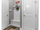 Bright hallway featuring a coat rack and bench adding a welcoming touch at 6150 Rolling Rock Ln, Noblesville, IN 46062