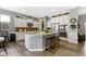 Well-lit kitchen with a granite island and stainless steel appliances, perfect for cooking at 6150 Rolling Rock Ln, Noblesville, IN 46062