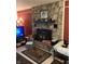 Cozy living room showcasing a stone fireplace, perfect for cozy evenings and gatherings at 6430 E Stop 11 Rd, Indianapolis, IN 46237