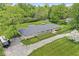 Aerial view of the property showcasing its well-maintained yard and landscaping at 6464 Whitley Ln, Indianapolis, IN 46260